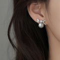 Elegant Bow Stud Earrings With Faux Pearls, Round Zircon Accents And Silver Pins For Women view 4