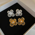 Gold Plated Copper Zircon Hollow Flower Stud Earrings Light Luxury Minimalist Floral Jewelry view 1