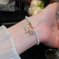18K Gold Plated Faux Pearl Horse And Star Charm Bangle Minimalist Light Luxury Daily Jewelry view 4