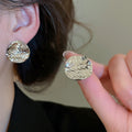 18K Gold Plated Copper Wrinkled Round Geometric Stud Earrings For Women Light Luxury Style view 4