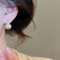 Copper Zircon Round Snowflake Stud Earrings With Wrinkle Texture Minimalist Modern Light Luxury Style view 3