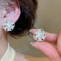 18K Gold Plated Metal Flower Clip-on Earrings For Women, Minimalist Light Luxury Floral Ear Jewelry view 4