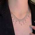 Light Luxury Metal Rice Bead Tassel Sweater Necklace, Geometric Round Pendant Clavicle Chain view 4