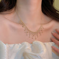 Light Luxury Metal Rice Bead Tassel Sweater Necklace, Geometric Round Pendant Clavicle Chain view 2