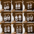 Miao Silver Plated Ethnic Peacock Bell Tassel Drop Earrings With Hollow Leaf Charm view 3