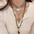 Light Luxury Leather And Iron Round Pendant Sweater Necklace For Women Trendy Geometric Collarbone Chain view 1