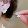 14K Gold Plated Cat Eye Stone Flower Stud Earrings For Women Petite Light Luxury Floral Jewelry view 1