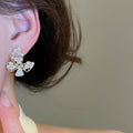 18K Gold Plated Zircon Hollow Butterfly Faux Pearl Stud Earrings For Women Light Luxury view 3