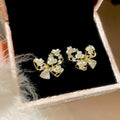18K Gold Plated Zircon Hollow Butterfly Faux Pearl Stud Earrings For Women Light Luxury view 4