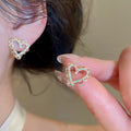 18K Gold Plated Copper Hollow Heart Zircon Stud Earrings With Silver Posts For Women view 4