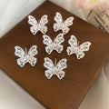 Light Luxury Copper Hollow Butterfly Zircon Enamel Stud Earrings With Silver Posts view 3