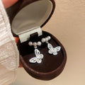 Elegant Butterfly Stud Earrings With Simulated Pearl Zircon Accents And Silver Tone Posts view 2