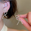 Minimalist Twisted Bow Alloy Stud Earrings For Women, Fashion OL Trendy Niche Ear Jewelry view 1