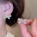 French Light Luxury Copper Zircon Flower Bow Pearl Stud Earrings For Women Fashion Jewelry view 4