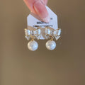 French Light Luxury Copper Zircon Flower Bow Pearl Stud Earrings For Women Fashion Jewelry view 3