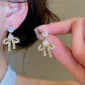 18K Gold Plated Silver Post Zircon Bow Faux Pearl Stud Earrings Elegant Light Luxury Jewelry view 3