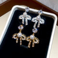 18K Gold Plated Silver Post Zircon Bow Faux Pearl Stud Earrings Elegant Light Luxury Jewelry view 4
