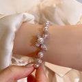 Light Luxury Faux Pearl Beaded Bangle With Rose Zircon Butterfly Charm For Women view 4