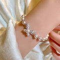 Light Luxury Faux Pearl Beaded Bangle With Rose Zircon Butterfly Charm For Women view 2