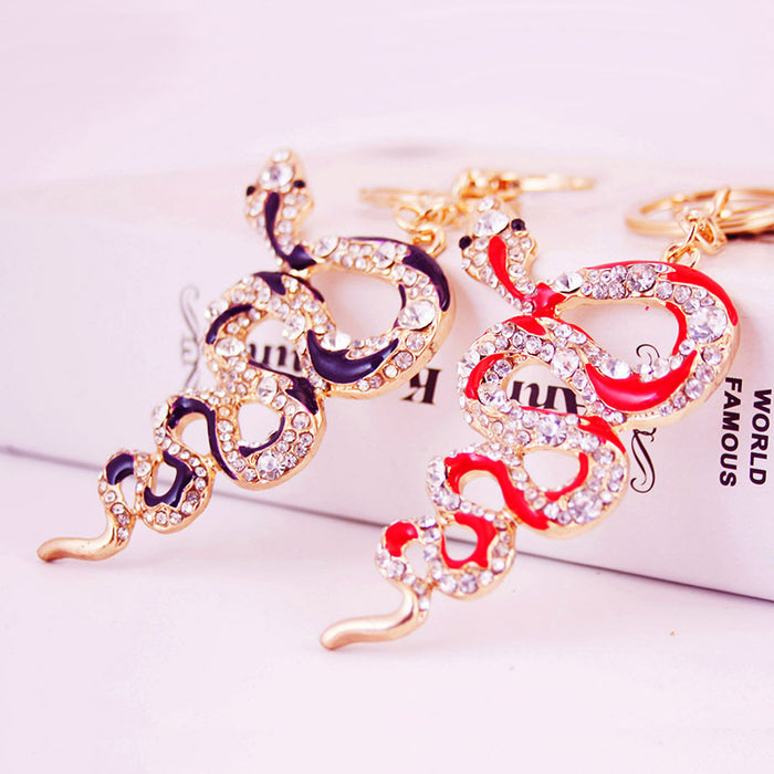 Red And Purple Rhinestone Coiled Snake Keychain With Gold-Tone Ring