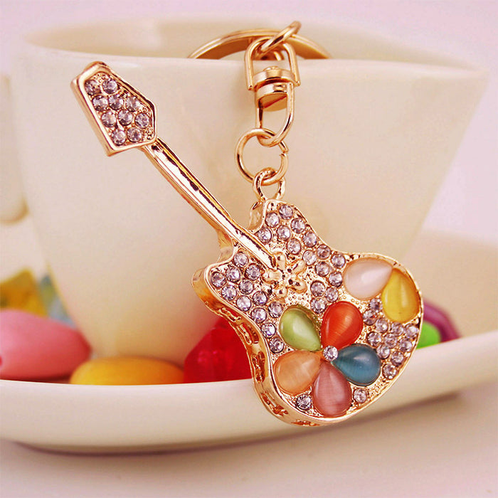 Gold-Tone Guitar Keychain With Rhinestones And Multicolor Stones