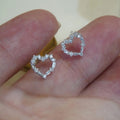 Sweet Hollow Heart Stud Earrings For Women With Sparkling Geometric Zircon Inlay view 1