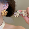Polished Iron Flower Stud Earrings For Women, Minimalist Modern Light Luxury Jewelry view 2