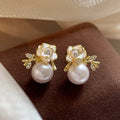 18K Gold Plated Silver Needle White Camellia Faux Pearl Stud Earrings For Elegant Office Style view 1