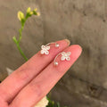 Silver Plated Copper Hollow Flower Screw Back Stud Earrings For Women Minimalist Sweet Style view 2