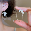 Copper Bow Hoop Earrings With Zircon Accents And Enamel Detail Playful Light Luxury Style view 3