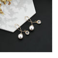 Gold Loop Wire Pearl Look Ball and Nest Drop Earrings view 3