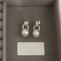 Simple Modern Round Faux Pearl Stud Earrings With Silver Posts For Women Light Luxury Jewelry view 4