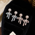 French Elegant Bow Stud Earrings With Zircon Enamel And Faux Pearl Sweet Style Jewelry view 3