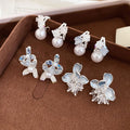 Elegant Floral Faux Pearl Stud Earrings With Enamel Petals Modern Minimalist Luxury Style view 3
