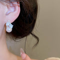 Elegant Floral Faux Pearl Stud Earrings With Enamel Petals Modern Minimalist Luxury Style view 4