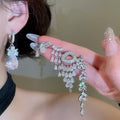 Light Luxury Copper Zircon Waterdrop Flower Stud Earrings Elegant Court Style Jewelry view 2