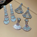 Vintage Court Style Copper Zircon Hollow Flower Triangle Stud Earrings view 3