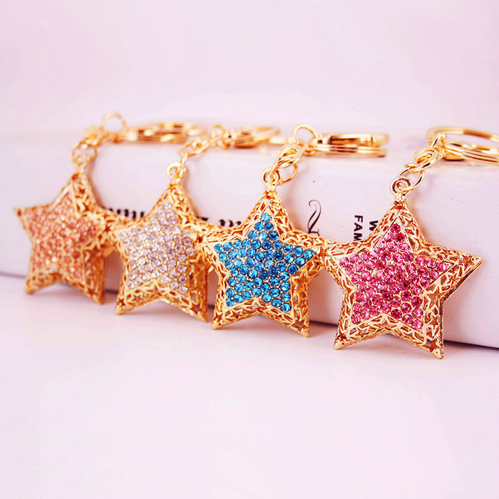 Gold Tone Metal Star Keychain With Colorful Rhinestone Center