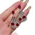 Chic Copper Zircon Hollow Gourd Stud Earrings New Chinese Retro Geometric Ethnic Style Jewelry view 5