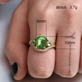 Gold Tone Green Emerald Cut Halo Ring In A Polished Decorative Design view 5