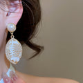 French Vintage Oval Faux Pearl Stud Earrings With Silver Needle Posts And Enamel Oil Drip Design view 3