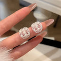 Korean Ballet Style Faux Pearl Stud Earrings With Zircon Hollow Oval Geometric Design view 3