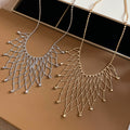 Minimalist Light Luxury Copper Hollow Geometric Tassel Collarbone Necklace view 2