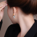 Metal Rhinestone Inlaid Two Tone Gold Silver Flower Stud Earrings For Women Niche Luxury Style view 4