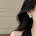 Korean Minimalist Irregular Geometric Faux Pearl Stud Earrings With Rhinestone Twisted Hollow Design view 4