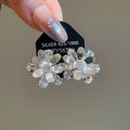 Light Luxury Copper Floral Stud Earrings With Glazed Flower And Sparkling Rhinestone Design view 1