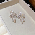 Korean Sweet Princess Faux Pearl Zircon Bow Clip-on Earrings, Light Luxury No-Piercing Ear Jewelry view 4