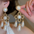 Vintage Floral Waterdrop Faux Pearl Stud Earrings With Silver Pins For Elegant Evening Wear view 1