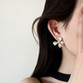 White Enamel Flower Faux Pearl Stud Earrings For Women 2026 Fashion OL Light Luxury Silver Needle Jewelry view 2