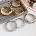 European American Smooth Metal Geometric Irregular Bangle Light Luxury Designer Bracelet For Women view 2